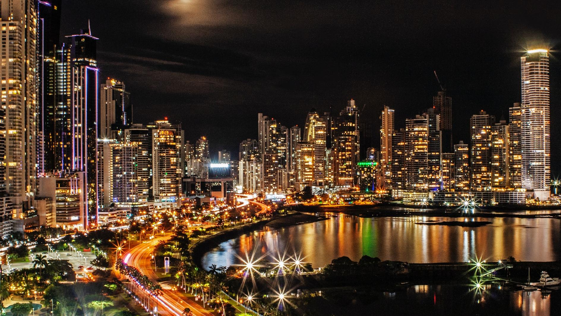 city lights and buildings during nighttime